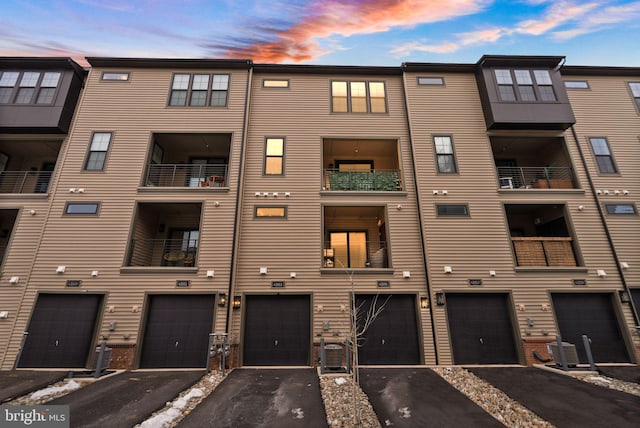 outdoor building at dusk featuring central AC