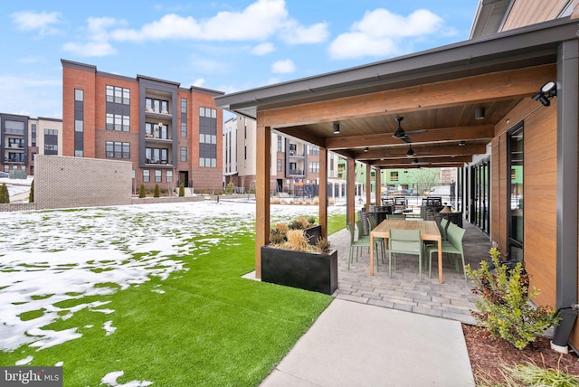 view of yard featuring ceiling fan