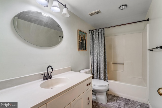 full bathroom featuring toilet, shower / tub combo, and vanity