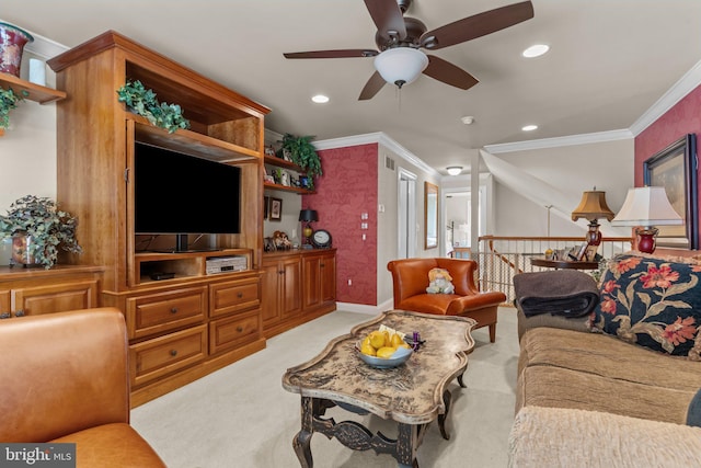 living room featuring crown molding, light carpet, and ceiling fan