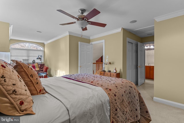 carpeted bedroom featuring ceiling fan, ornamental molding, and a closet