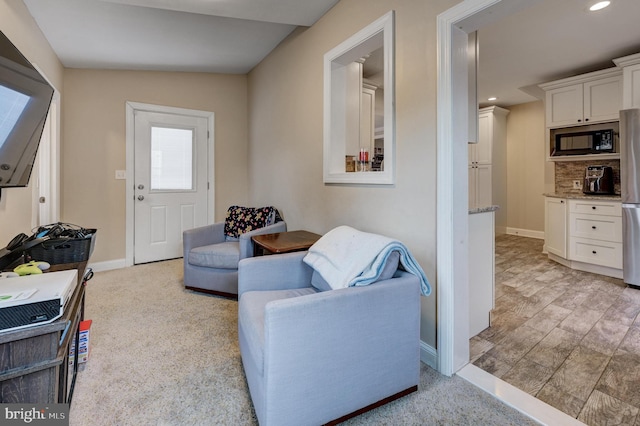 living room with vaulted ceiling