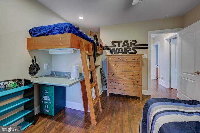 bedroom featuring dark wood-type flooring