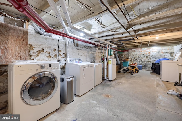 basement with washing machine and clothes dryer