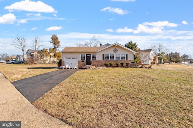 ranch-style house with a garage and a front lawn