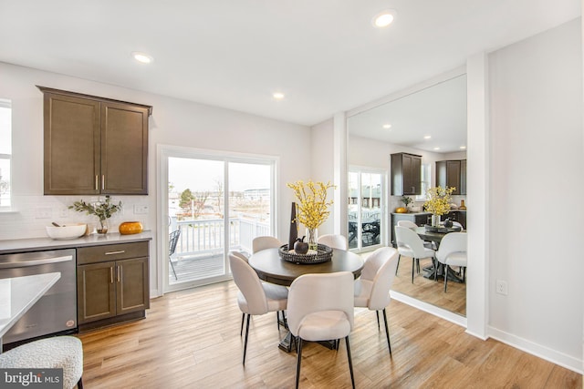 dining area with light wood-type flooring