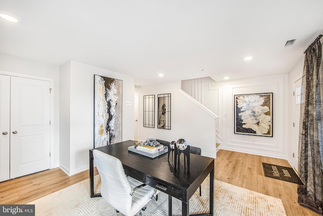 dining space featuring light hardwood / wood-style flooring