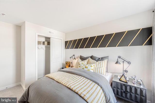 carpeted bedroom with a closet