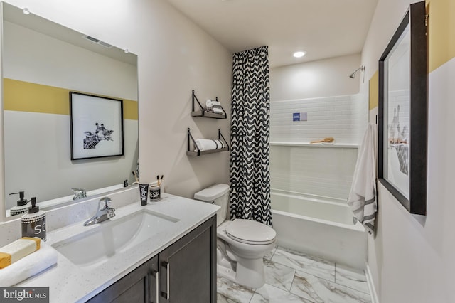 full bathroom with toilet, vanity, and shower / bath combo with shower curtain