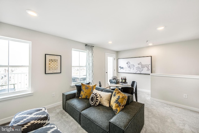 living room featuring light carpet