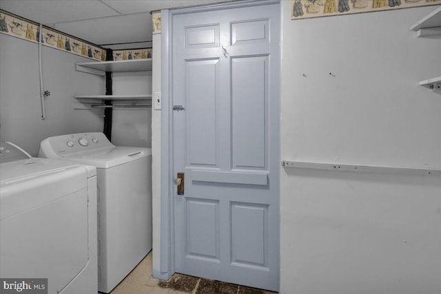 laundry room with independent washer and dryer