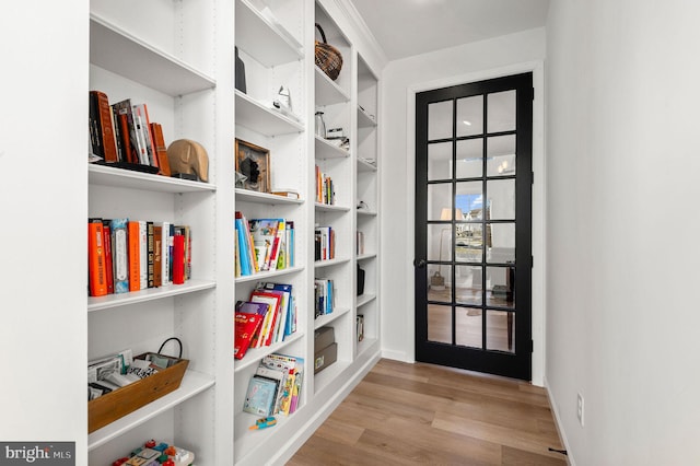 corridor featuring light hardwood / wood-style floors