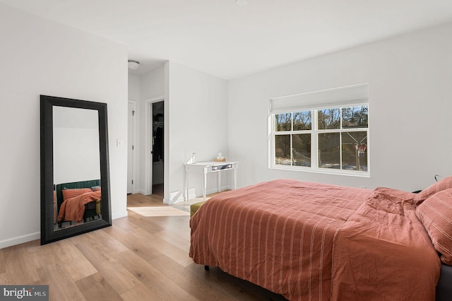 bedroom featuring light wood-type flooring