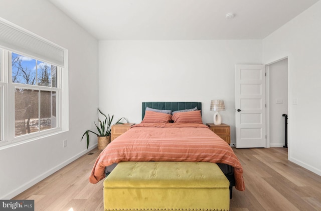 bedroom featuring light wood-type flooring