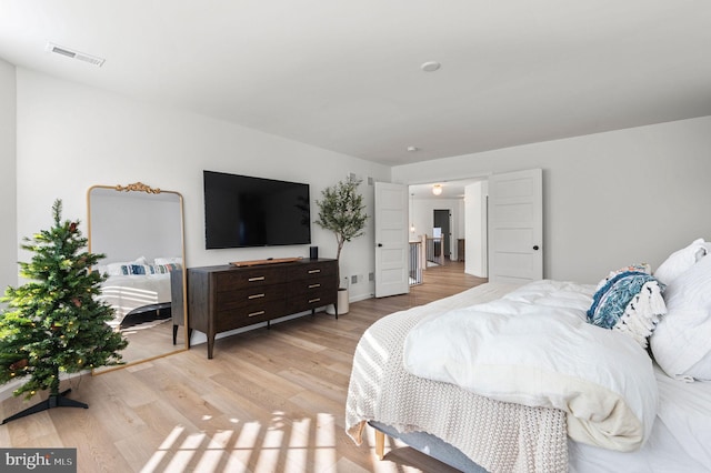 bedroom featuring light hardwood / wood-style floors