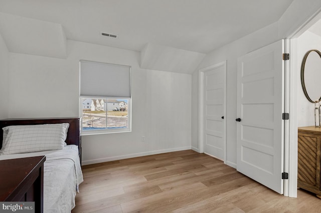 bedroom featuring light hardwood / wood-style floors