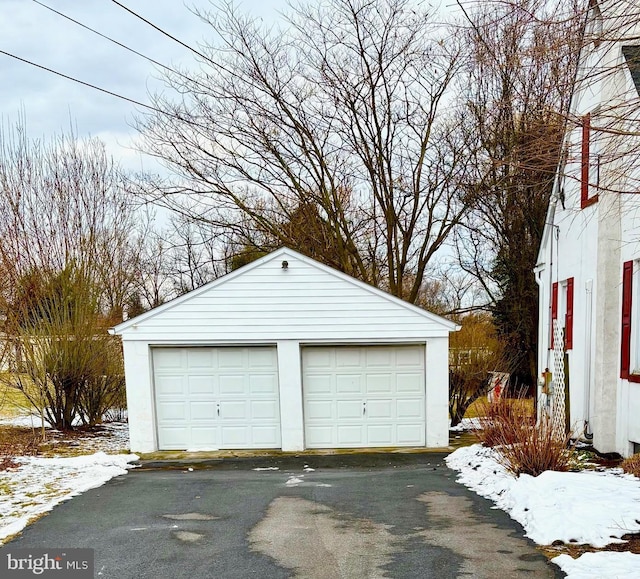 view of snow covered garage