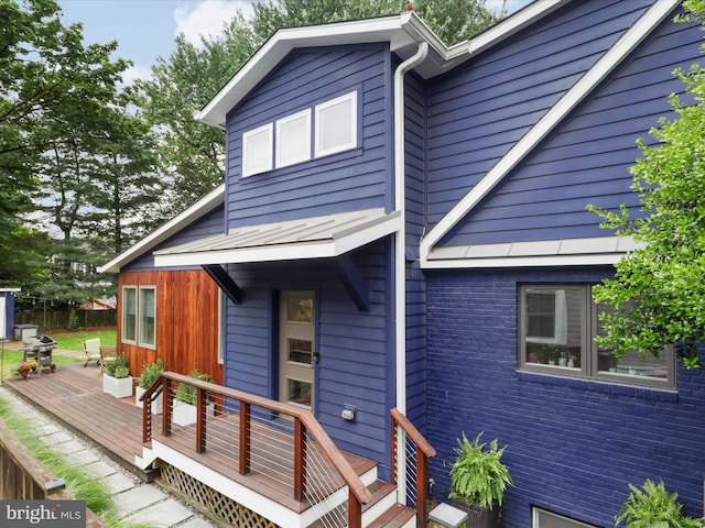 6230 21st St N, Arlington, VA 22205 - view of front of property featuring a wooden deck and brick siding