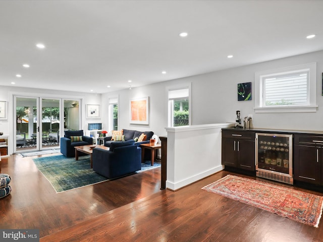 6230 21st St N, Arlington, VA 22205 - living area featuring beverage cooler, dark wood finished floors, healthy amount of natural light, and recessed lighting