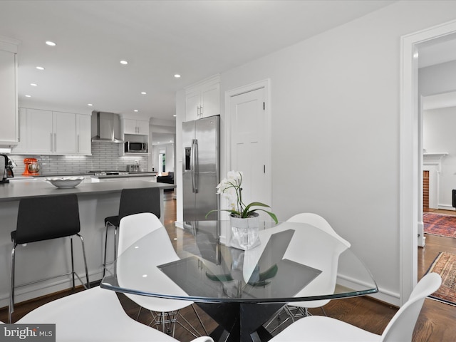 6230 21st St N, Arlington, VA 22205 - dining space featuring wood finished floors, recessed lighting, and baseboards
