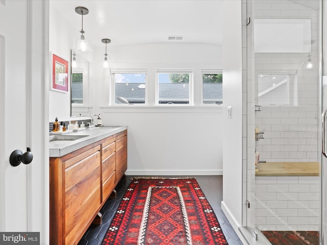 6230 21st St N, Arlington, VA 22205 - bathroom featuring double vanity, a shower stall, and baseboards