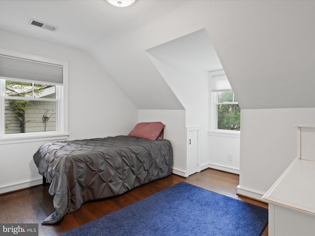 6230 21st St N, Arlington, VA 22205 - bedroom featuring wood finished floors, vaulted ceiling, and baseboard heating