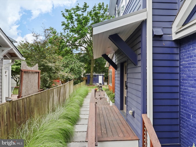 6230 21st St N, Arlington, VA 22205 - wooden terrace with a storage unit