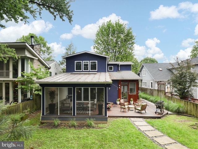 6230 21st St N, Arlington, VA 22205 - back of house featuring a sunroom, a deck, an outdoor hangout area, metal roof, and a standing seam roof