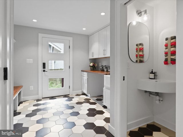 6230 21st St N, Arlington, VA 22205 - bathroom featuring baseboards, recessed lighting, tile patterned floors, and a sink