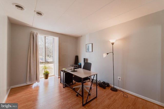 office space featuring light wood-type flooring