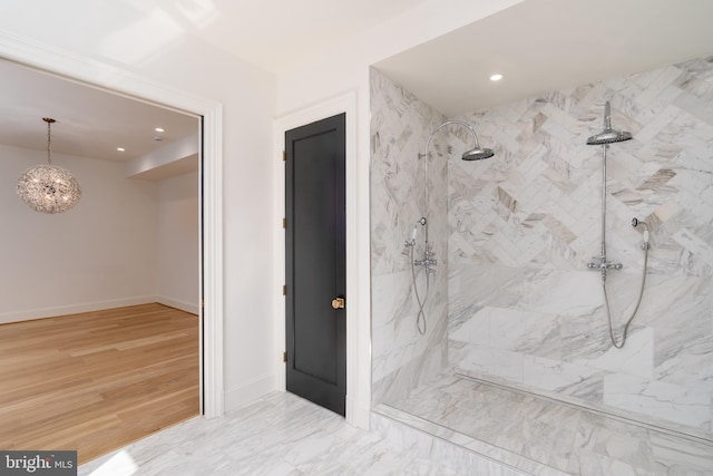 full bath featuring wood finished floors, recessed lighting, a walk in shower, and baseboards