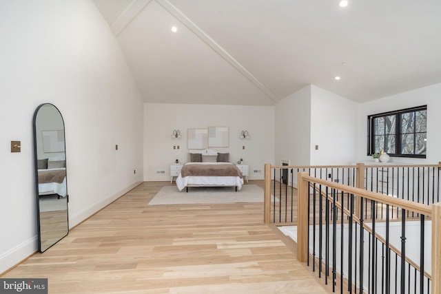 bedroom with vaulted ceiling, light wood-style flooring, recessed lighting, and baseboards