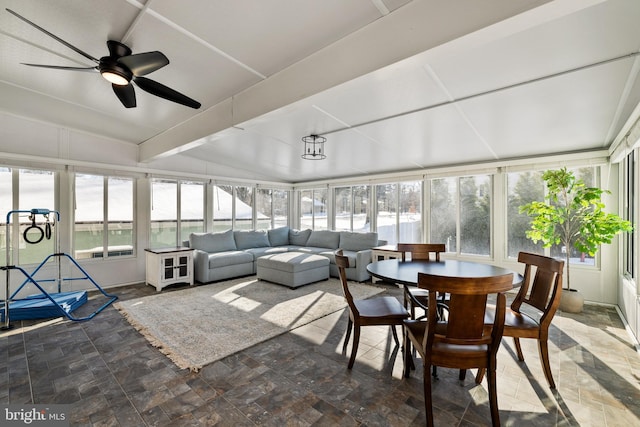 sunroom with ceiling fan