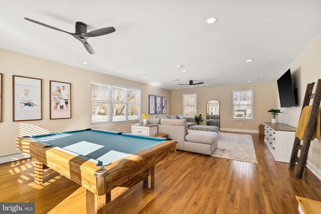 recreation room with ceiling fan, billiards, plenty of natural light, and hardwood / wood-style flooring