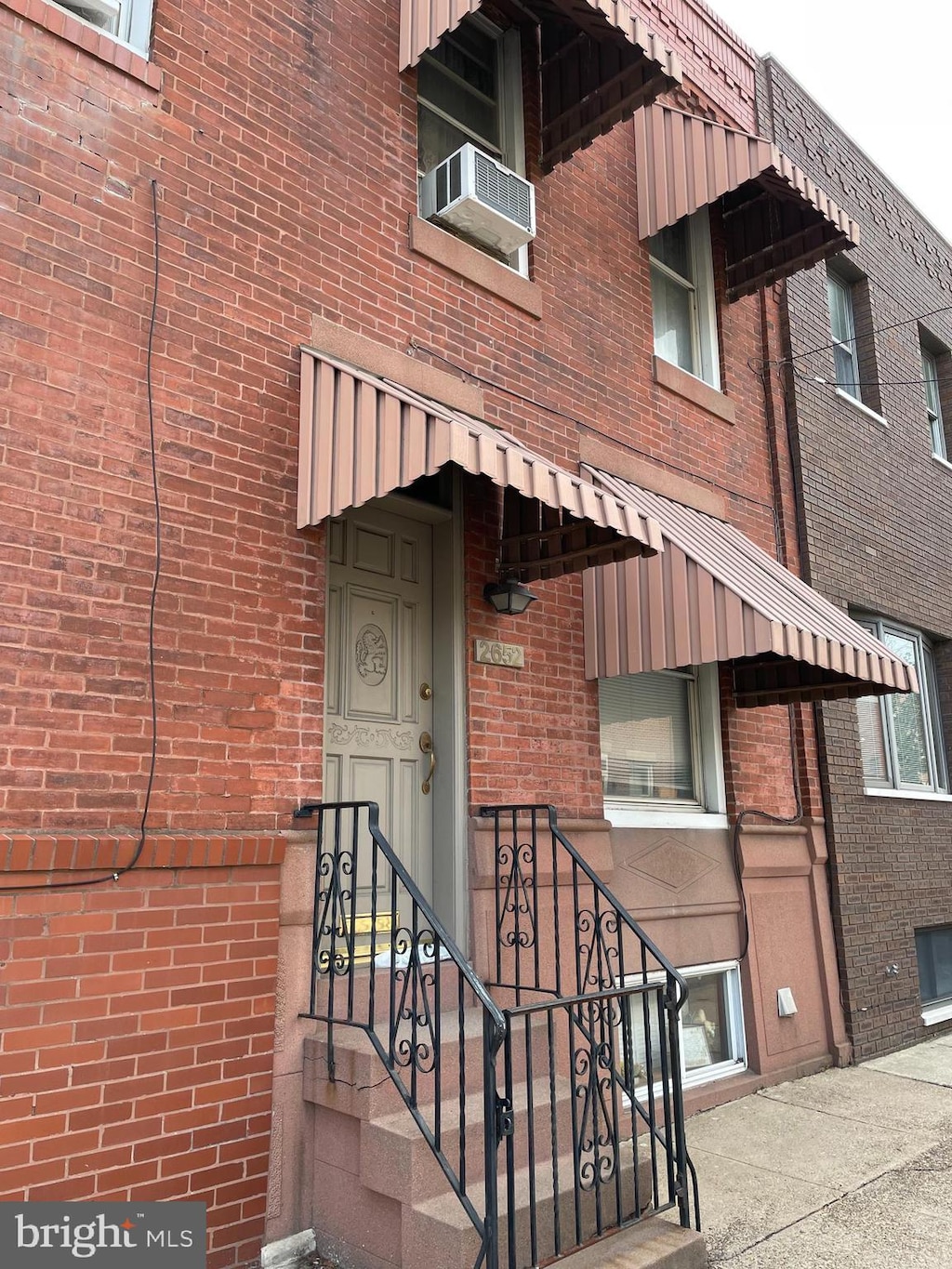 property entrance with cooling unit