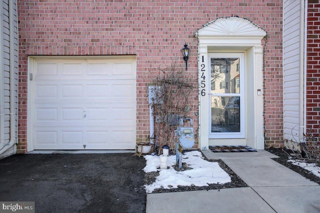 property entrance with a garage