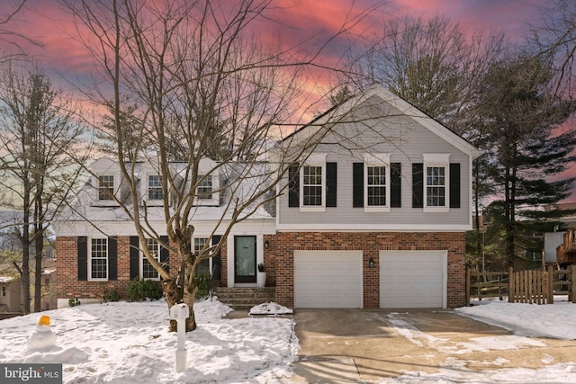 view of front of property featuring a garage