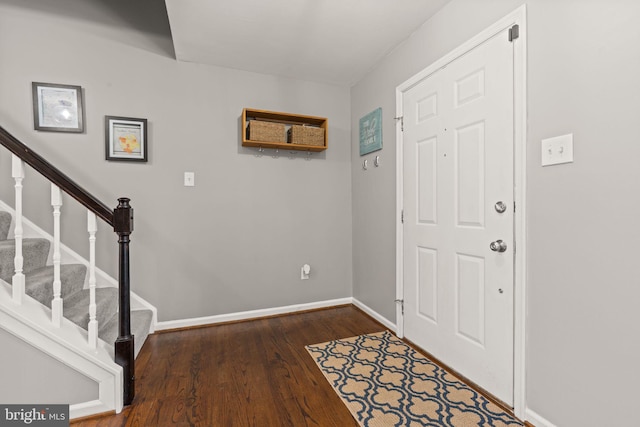 entryway featuring dark wood-type flooring