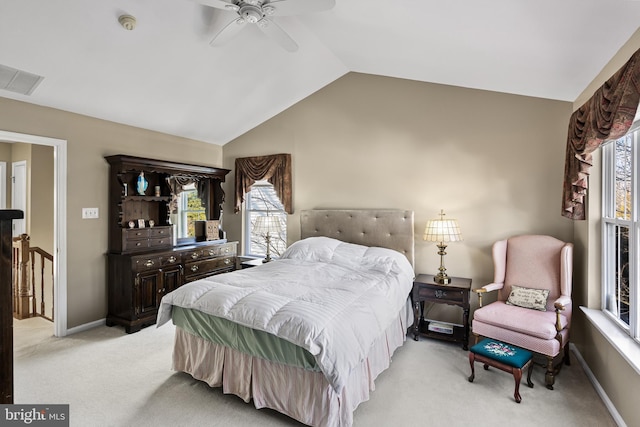 carpeted bedroom with lofted ceiling and ceiling fan