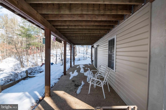 view of snow covered patio