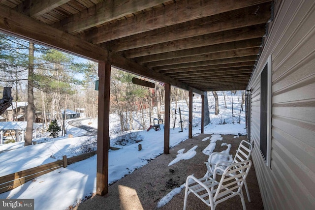 view of snow covered patio