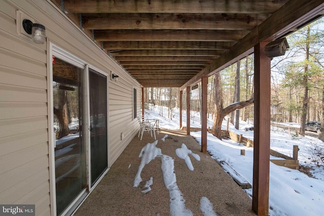 exterior space featuring beamed ceiling