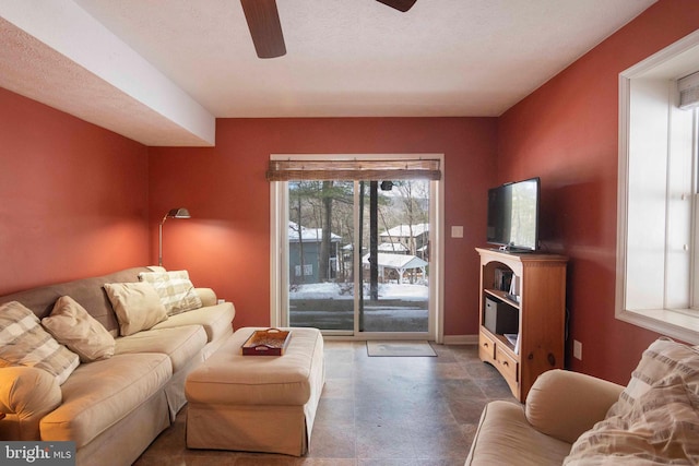 living room featuring ceiling fan