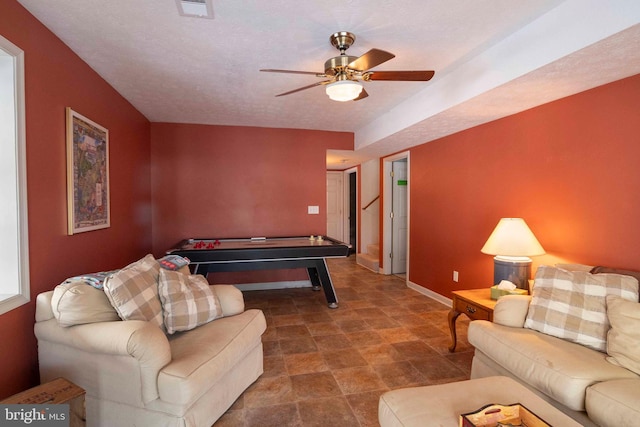 game room with ceiling fan