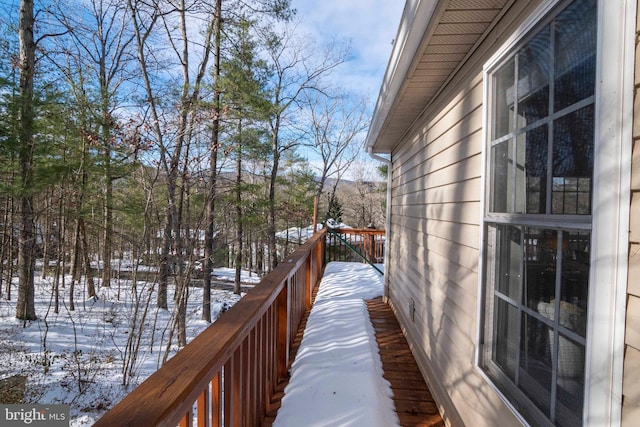 view of snow covered deck