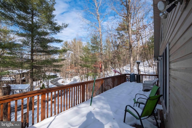 view of snow covered deck