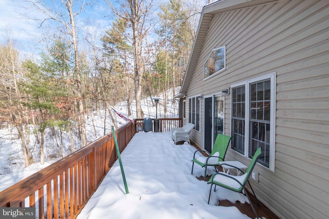 view of snow covered deck