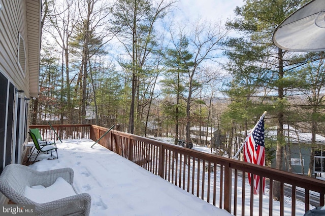 view of snow covered deck