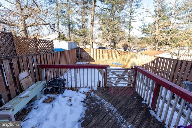 view of snow covered deck