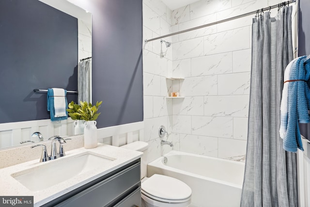 full bathroom featuring shower / tub combo, vanity, and toilet